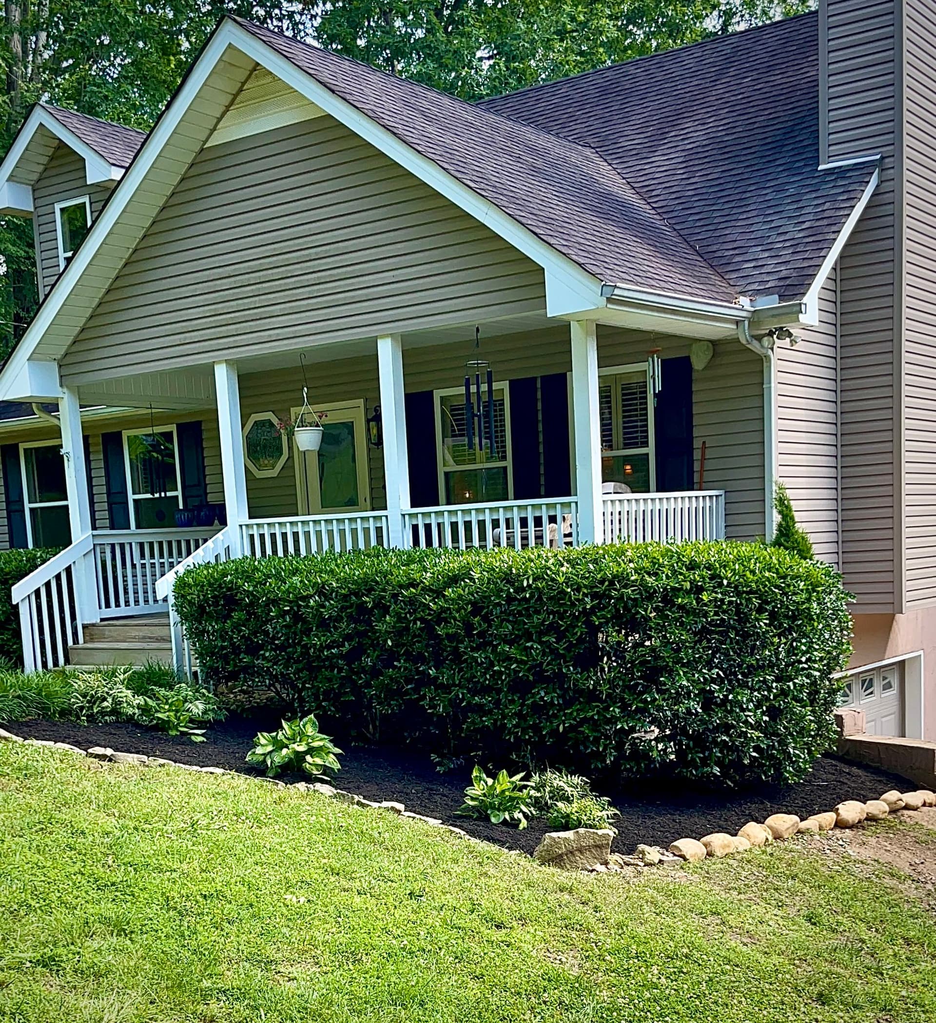 Fresh Mulch and New Plants Give This Front Yard a Sharp Look image
