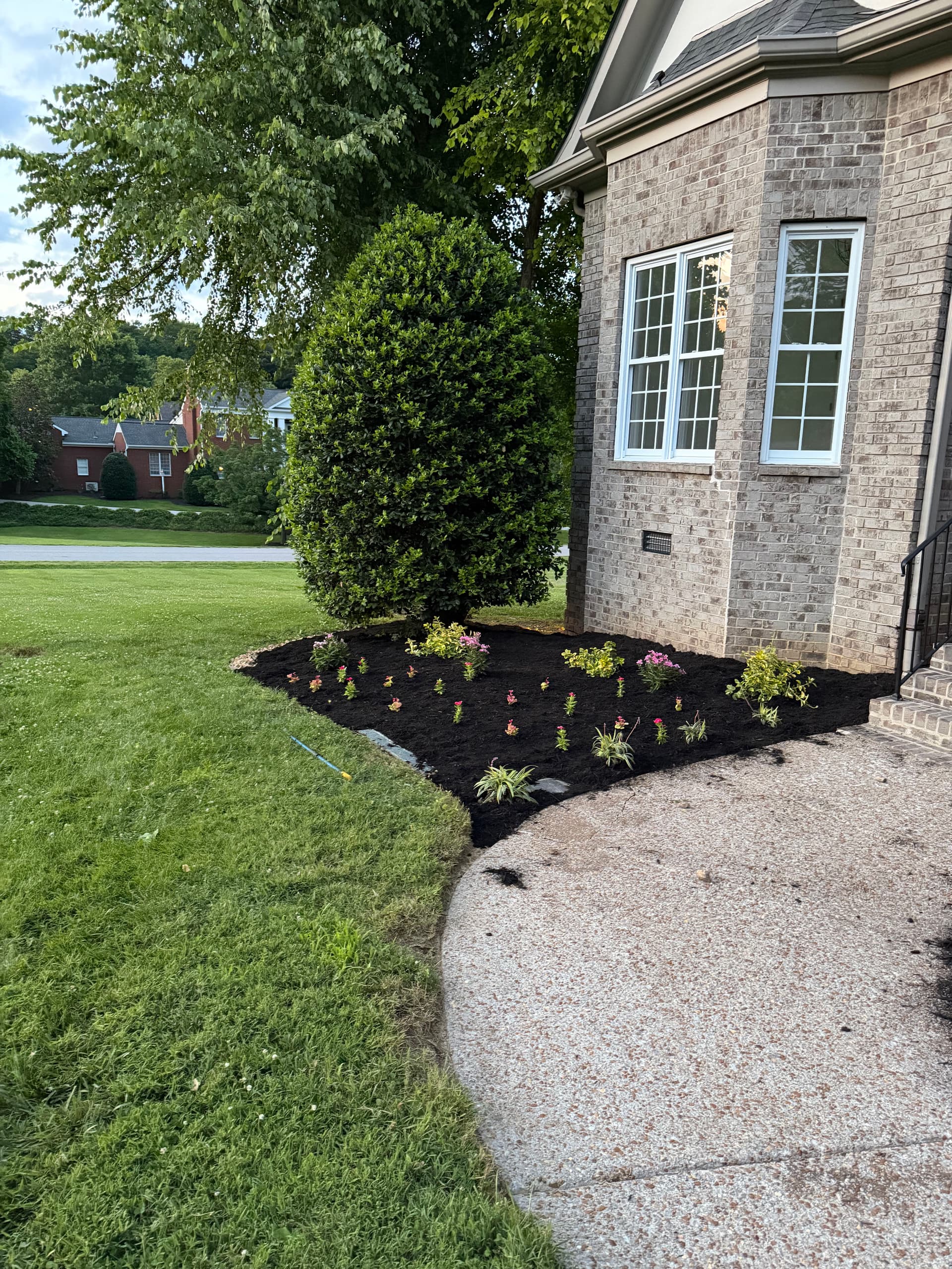 Fresh Mulch and Clean Beds That Make a Home Stand Out image